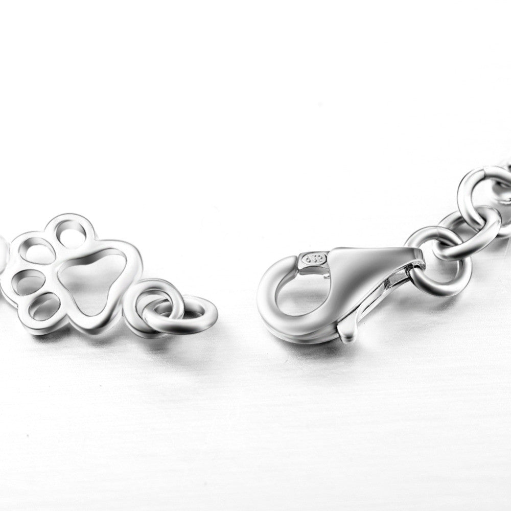 Ezüst Kutyanyom és Csont Charmmal Díszített Karkötő